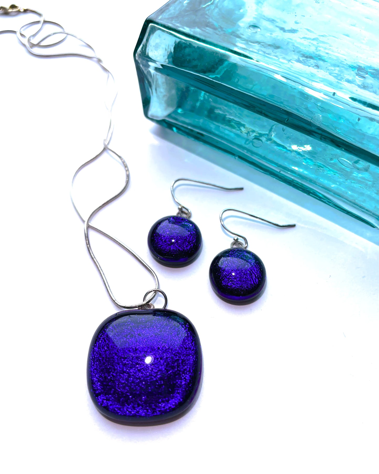 Bright blue dichroic pendant and earring set