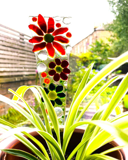 Red and scarlet fused glass flower plant stake with green aventurine flowers